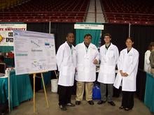Left photo: Team in front of the UCR demonstration booth.